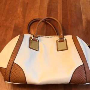 White with brown straps arm bag